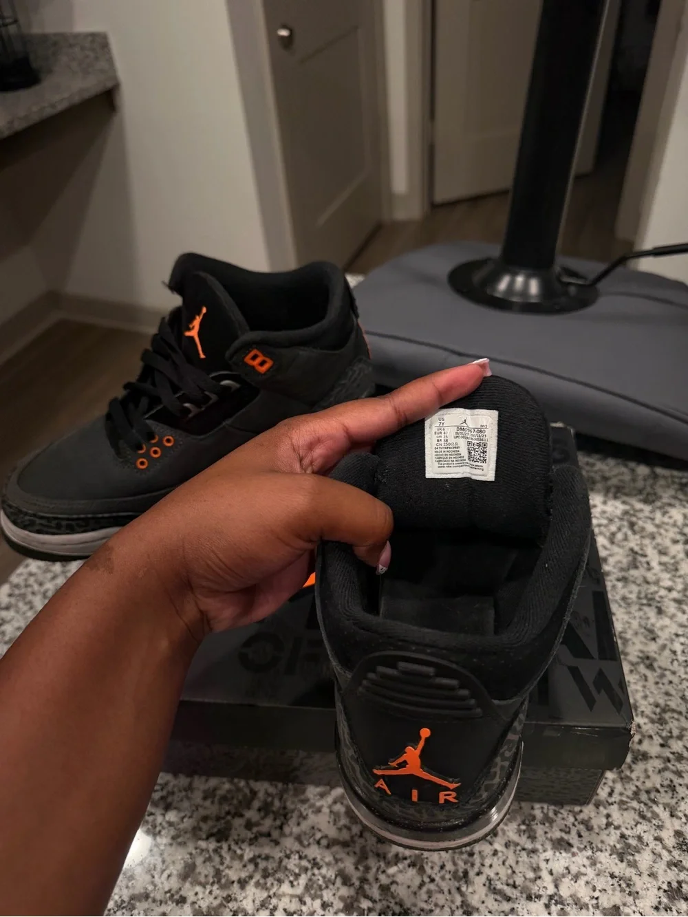 Jordan Retro Sneakers in Black and Orange Accents